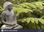 stone-statue-of-lord-buddha-meditating-in-bodhgaya-under-bodhi-tree-abjphc